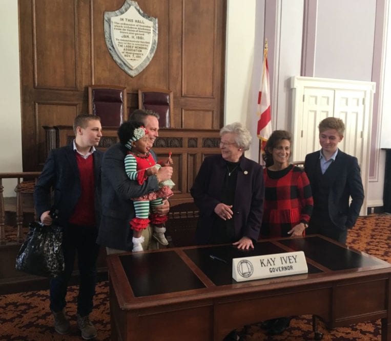 Alabama families set record for adopting foster children