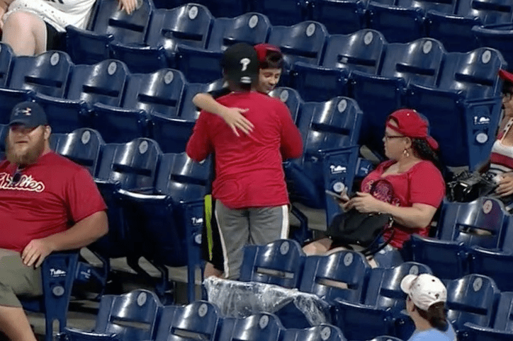 Watch a young Phillies fan graciously gift his foul ball to another kid during Wednesday night's game