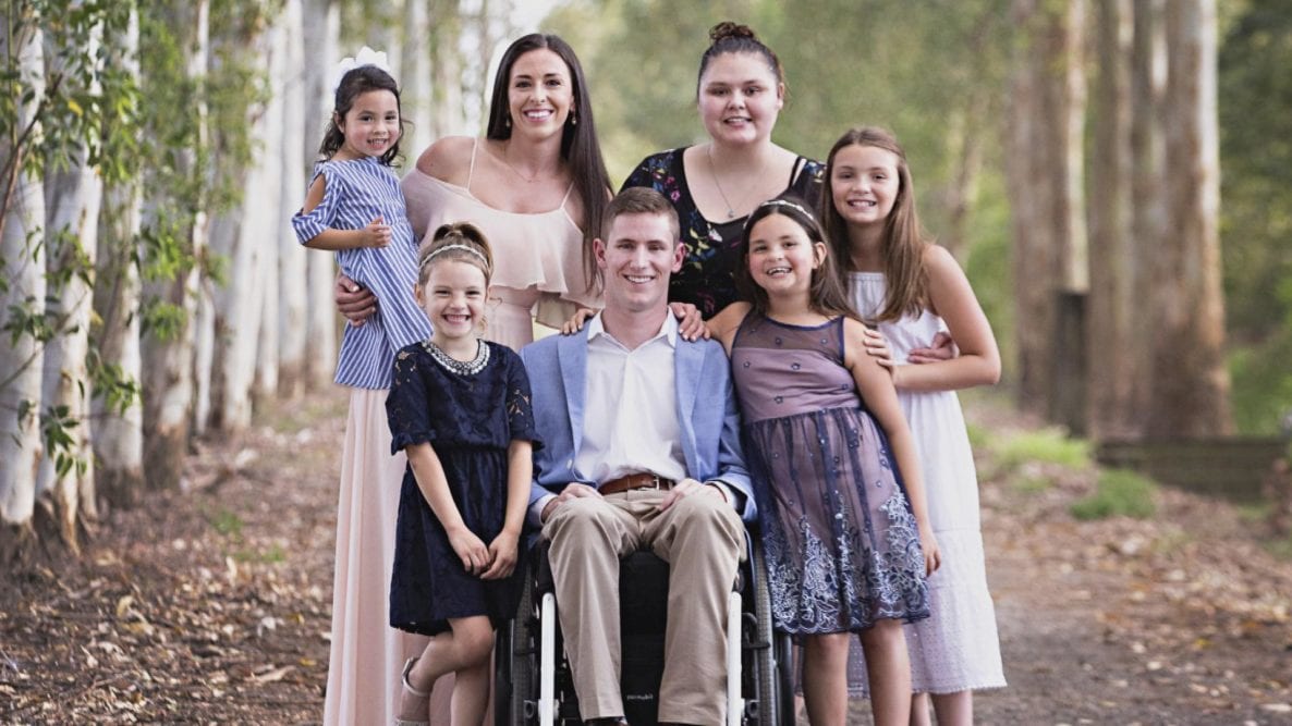 Paralyzed Man Adopts 5 Foster Children, All Girls. They’re “Our Daughters Forever”