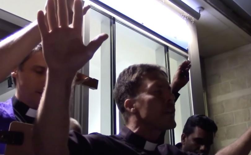 7 priests, over 100 Catholics pray outside Satanic ‘black mass’ in Ottawa
